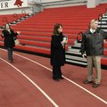 EARLY TRACKING - John Logan Burrow, left, Washington County election commissioner, walks Tuesday wit...