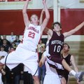 Farmington’s Jason Purdy rebounds the ball over Huntsville’s Tucker Trumbo in the second half of Tue...
