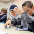 DUCTIGAMI - Kyle Rookey, 11, from left, McKay Clark, 11, Graham Mynatt, 11, and Warren Smith, 10, bu...