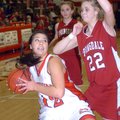 Fort Smith Northside’s Jacquelyn Myers drives against Springdale High’s Christina Wood during Tuesda...