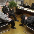 Jeff Jeffus, from left, president, and Tom Stallbaumer, publisher, both of Northwest Arkansas Newspa...