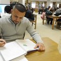 Hilberto Gonzalez, a criminal justice student from Rogers, studies algebra Wednesday at NorthWest Ar...