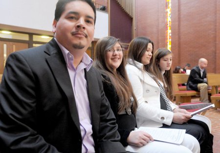 
                               
                                  Photo by David Frank Dempsey&mdash;
                               
                           
                           Guillermo Castillo and his family await a ceremony that will receive him into the Episcopal Church. From left are Castillo, Audrey Herrera, 12, Araceli Castillo and Kimberly Herrera, 13. Araceli gave birth to the couple’s son, Anthony, a few hours after the ceremony ended.
