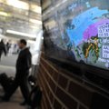 An image of the winter storm descending on Northwest Arkansas is shown on a monitor Thursday as trav...