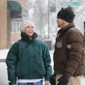 Leslie Holt smiles at David Erstine as they walk through the snow to eat lunch at Grubs in Fayettevi...