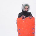 Katie Goll holds her sled in Wilson Park while sledding with her sorority sisters Friday, Jan. 29. i...