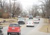 Traffic flows along Huntsville Road on Thursday in Fayetteville.