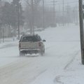 Russell Reed of Rogers walks along North Eighth Street Friday morning. Reed had the thoroughfare mos...