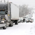 Motorists try to avoid stalled traffic on Interstate 540 by cutting through Lowell but are themselve...