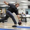 Springdale High senior Seth Eden bowls Wednesday in a match against Lincoln at the Springdale Bowl. ...