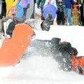 COLD AIR - Matthew Crenshaw, 12, hangs on, at least briefly, after his friend Zac Griffin, 12, right...