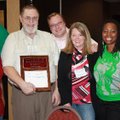 Scrabble Wars Chairwoman Macadda Peoples, from left, congratulates members of the winning team, Midd...