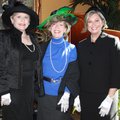 Cheryl Westmoreland, from left, Peggy Smith and Laura Rogers don party hats and gloves for the tea f...