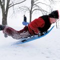 COLD AIR - Marc Miller, 13, of Springdale catches a bit of air after hitting a bump he and a friend ...