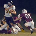 Prairie Grove running back Thomas Soehner tries to get by Huntsville defender Taylor Stone during th...