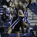 Fayetteville’s Sydney Conley, right, and Emma Clay, left, battle for a rebound against Springdale Ha...