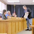 Chris Glass director of Benton County Services and Safety hands out maps of fire districts and city ...