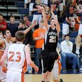 Bentonville’s Tyler Sanderlin shoots during a Jan. 26 game against Rogers Heritage in Rogers.