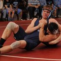 Springdale Har-Ber’s Ezra Ward, top, works a headlock on Springdale High’s Jhony Goodinez during dur...