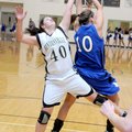 7A-WEST CONFERENCE - Bentonville’s Blaklee Sanders, left, and Rogers High’s Morgan Hook battle for a...