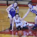 Farmington’s Anna Oxford loses control of the ball while being double-teamed by Berryville’s Megan D...