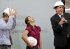 John Brown University senior construction management students Grant O’Neal (left) and Megan Owens join Vice President for Advancement Jim Krall during a news conference Tuesday at the Walker Student Center on the Siloam Springs campus. The school announced an anonymous $8 million donation that will help build a facility for engineering and construction management programs.
