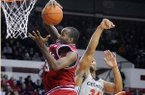  Arkansas' Marshawn Powell pulls in a rebound before Georgia's Albert Jackson (34) in the second half of  an NCAA college basketball game on Wednesday, Feb. 3, 2010, in Athens, Ga.   Arkansas beat Georgia 72-68.   