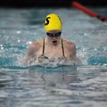 Bentonville’s Erin Suchy competes in the 200-yard individual medley race Thursday during the Springd...