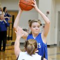 PREP BASKETBALL - Rogers High’s Sarah Groves looks for room to pass against Bentonville on Feb. 2 at...