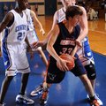 Fayetteville Woodland Junior High’s Jawan Smith, left, and Tyler McCullough surround Rogers Heritage...