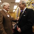 INTERNATIONAL COMMERCE - Former Arkansas Gov. Jim Guy Tucker, right, visits Thursday with Steve Clar...