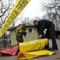 Lt. Devin Reaves, left, and Lt. Robert Hamilton, both of the Bella Vista Fire Department, work to re...