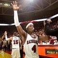 Arkansas sophomore Courtney Fortson celebrates with teammates following the Razorbacks' 82-79 overti...