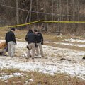 Officials with the Washington County Sheriff's Office collect information at the site of a plane cra...