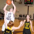 Gentry’s Terra Jones shoots over Prairie Grove’s Morgan Abernathy on Friday in Gentry.