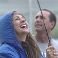 FLY FISHING LESSON - Rogers High School senior Taylor Murphy laughs after getting the hang of castin...