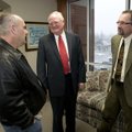 NEWSPAPER DONATION - Tom Stallbaumer, right, Northwest Arkansas Newspaper publisher, listens Friday ...