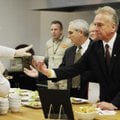 FOOD INTRODUCTION - Lisa Clayton, left, culinary team member, serves a bowl of tomato basil soup Fri...
