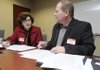JOSEPH PROJECT - Stephanie Meehan, left, with Cameron Smith Associates, reviews Brad Guthrie’s resume Wednesday during the 2010 Advance Workshop put on by The Joseph Project at John Brown University’s Rogers Center.
