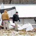 FATAL FLIGHT - Officials with the Washington County Sheriff’s Office collect information at the site...