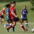 West's Elizabeth Brady moves up field against the East during the All Star game Tuesday June 23, 200...