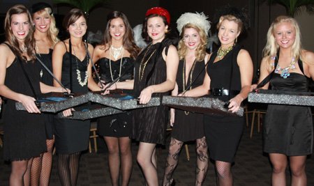 
                               
                                  Photo by Carin Schoppmeyer&mdash;
                               
                           
                           Volunteer Candy Girls Alyson Parsons, from left, Natalie Culberson, Mikaila Wilson, Ashley Shelton, Summer Conquest, Britney Haynes, Evan Clower and Holly Hilburn help out at the Jones Center’s Big Night.