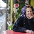 Opal Fly, owner of Opal Fly’s Feel Good Lounge, sits for a portrait Tuesday in Fayetteville.
