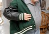 63 YEARS LATE - Jack Tickner puts on the Central Methodist University letterman’s jacket Friday he received Christmas Day. Tickner talked about the jacket at his home in Bentonville.