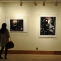 DOWNTOWN DISPLAYS - A visitor checks out photographs Thursday from Kat Wilson’s “Habitats” collectio...