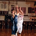Springdale guard Shelton Baird, right, pulls up for a jump shot as Har-Ber senior forward Matthew To...