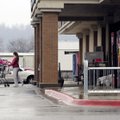 Shoppers walk in and out of Harps off Butterfield Coach Road on Thursday in Springdale. Police have ...