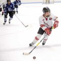 Northwest Arkansas Ice Hogs’ Jeremiah Fleeman, center, makes his way through the Rockhurst (Mo.) Aca...