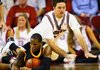 Arkansas' Stephen Cox fights for a loose ball with Appalachian State's Kellen Brand on Nov. 20, 2009 at Bud Walton Arena in Fayetteville.