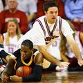 Arkansas' Stephen Cox fights for a loose ball with Appalachian State's Kellen Brand on Nov. 20, 2009...